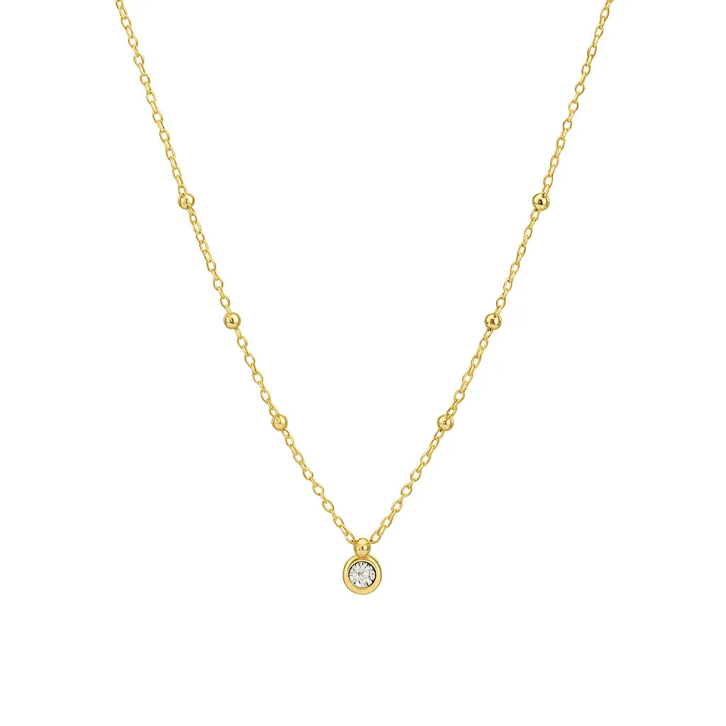 Jemný zlatý náhrdelník s čírym zirkónom a dekorovanou retiazkou – detail